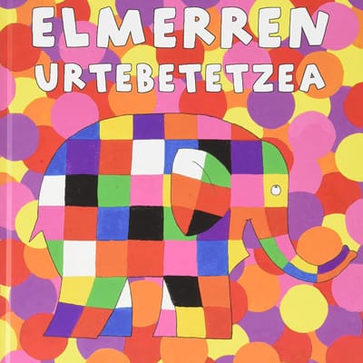 Portada del libro en euskera “Elmerren Urtebetetzea”, un cuento colorido para niños pequeños incluido en recomendaciones de cuentos en euskera.