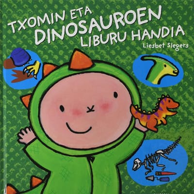 Portada del cuento en euskera “Txomin eta Dinosauroak”, un libro infantil para fans de los dinosaurios y recomendado en cuentos en euskera.